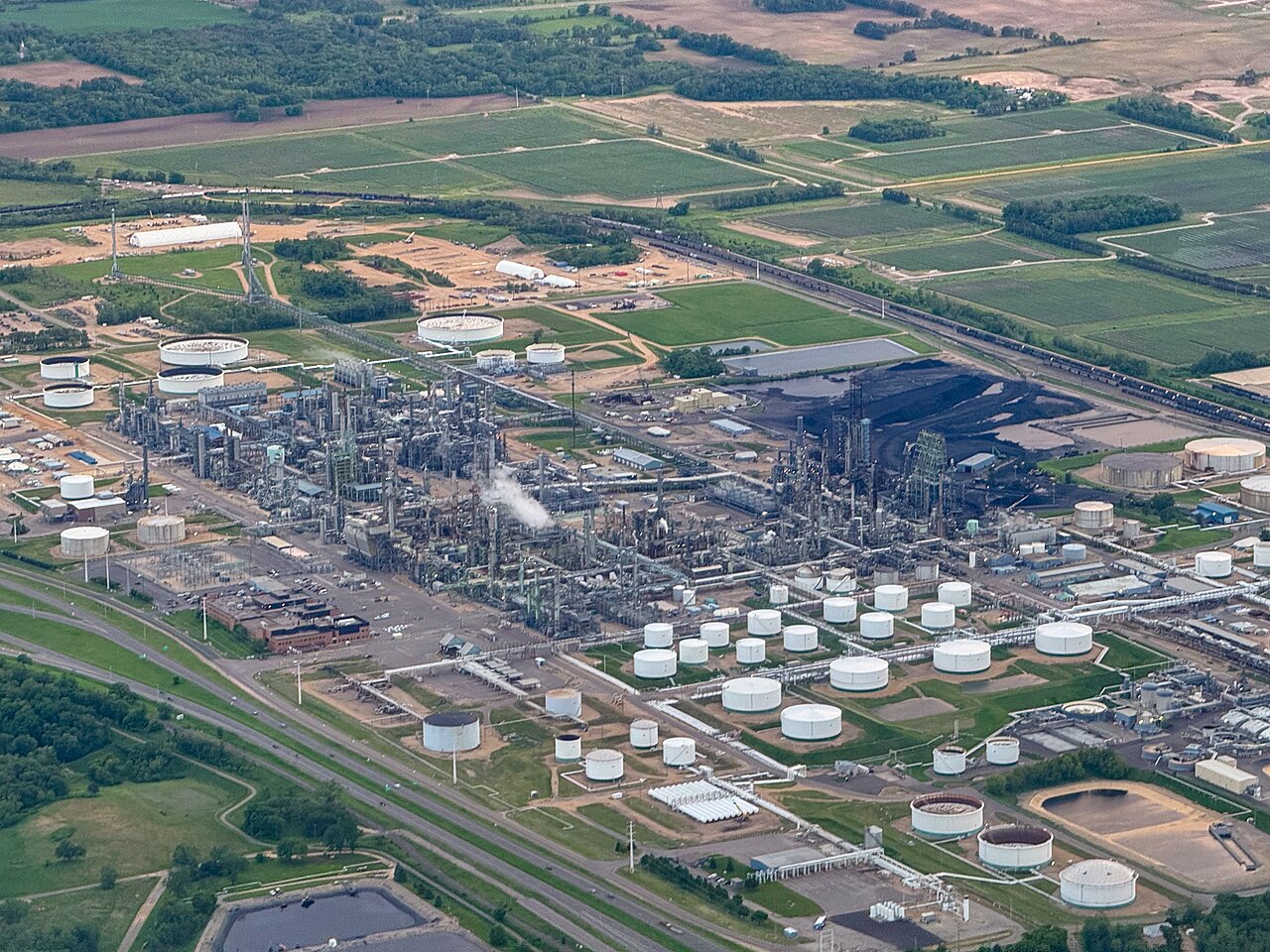 Aerial view of processing units, pipework and storage tanks at Pine Bend Refinery in Rosemount, Minnesota.